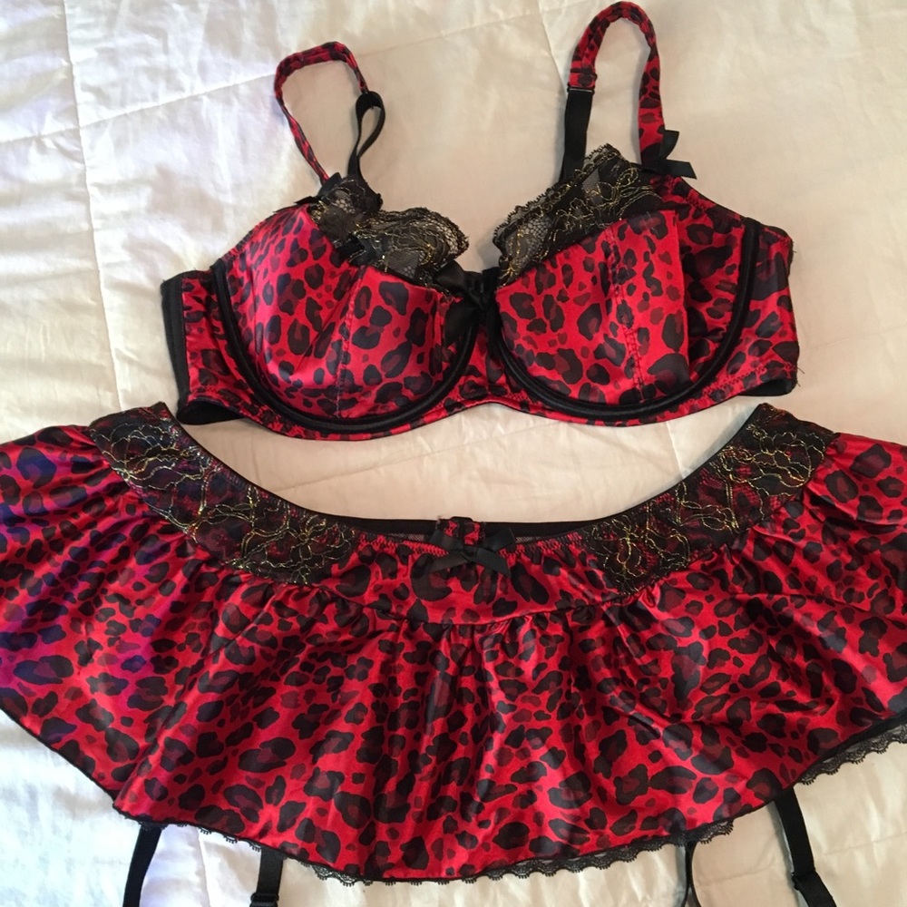 Red bra and garter set with gold and black accents